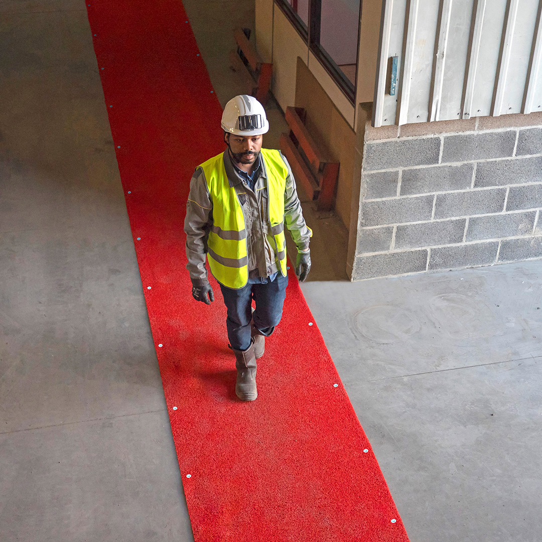 the spaghetti mat hard floor on a hard surface with a person walking over it