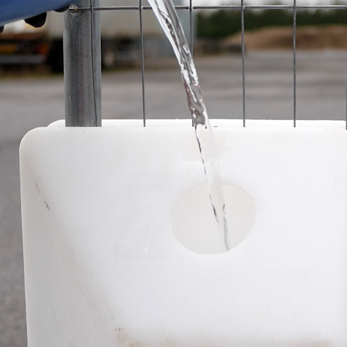Close up of Slot Blok being filled with water