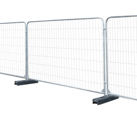 RT Standard construction fences placed side by side and securely connected, forming a continuous barrier