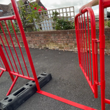 Close-up of Crossing Point gate held open, showing detail of door and handle